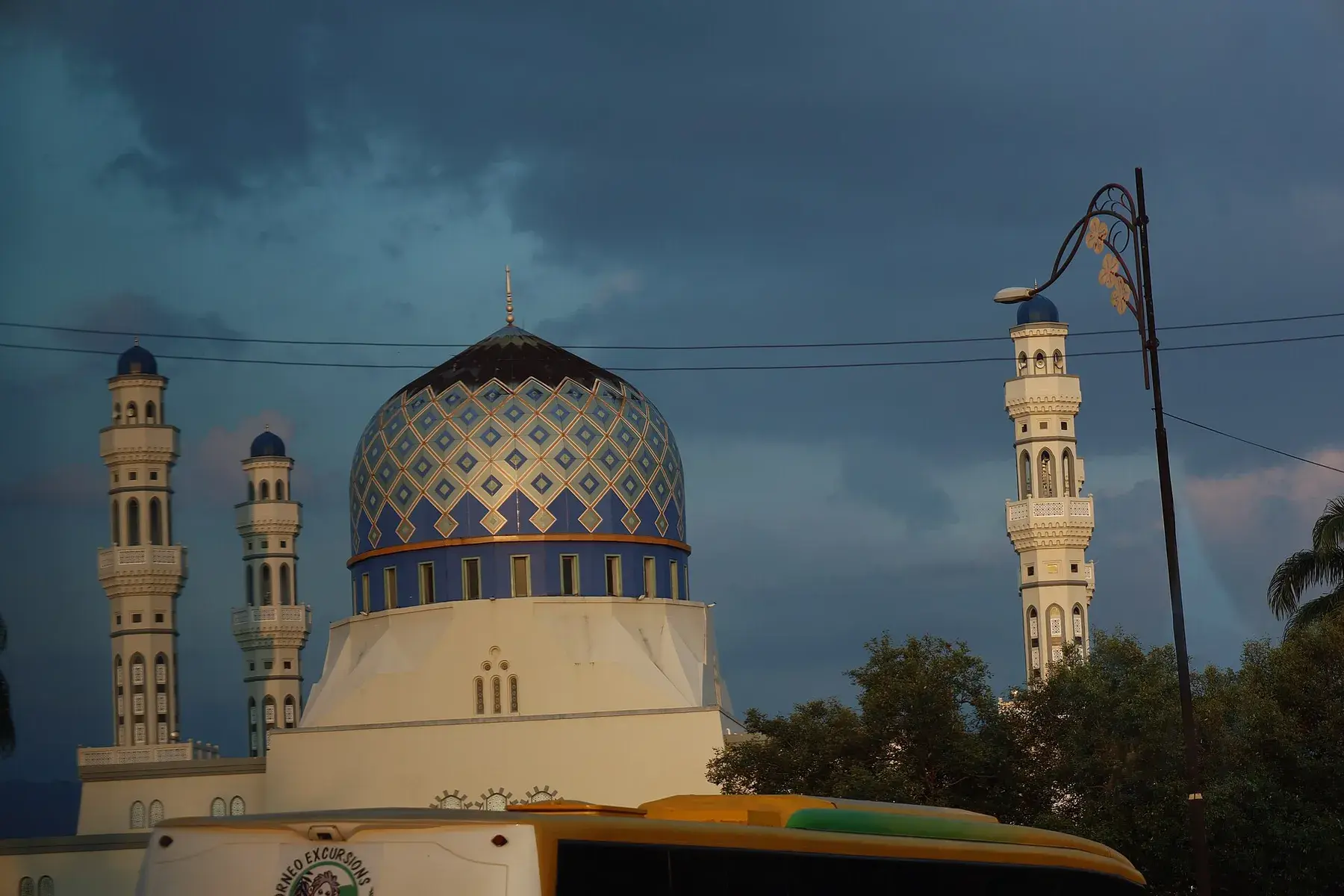 Kota Kinabalu City Mosque under an evening sky